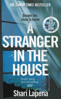 A stranger in the house - Shari Lapeña - książka